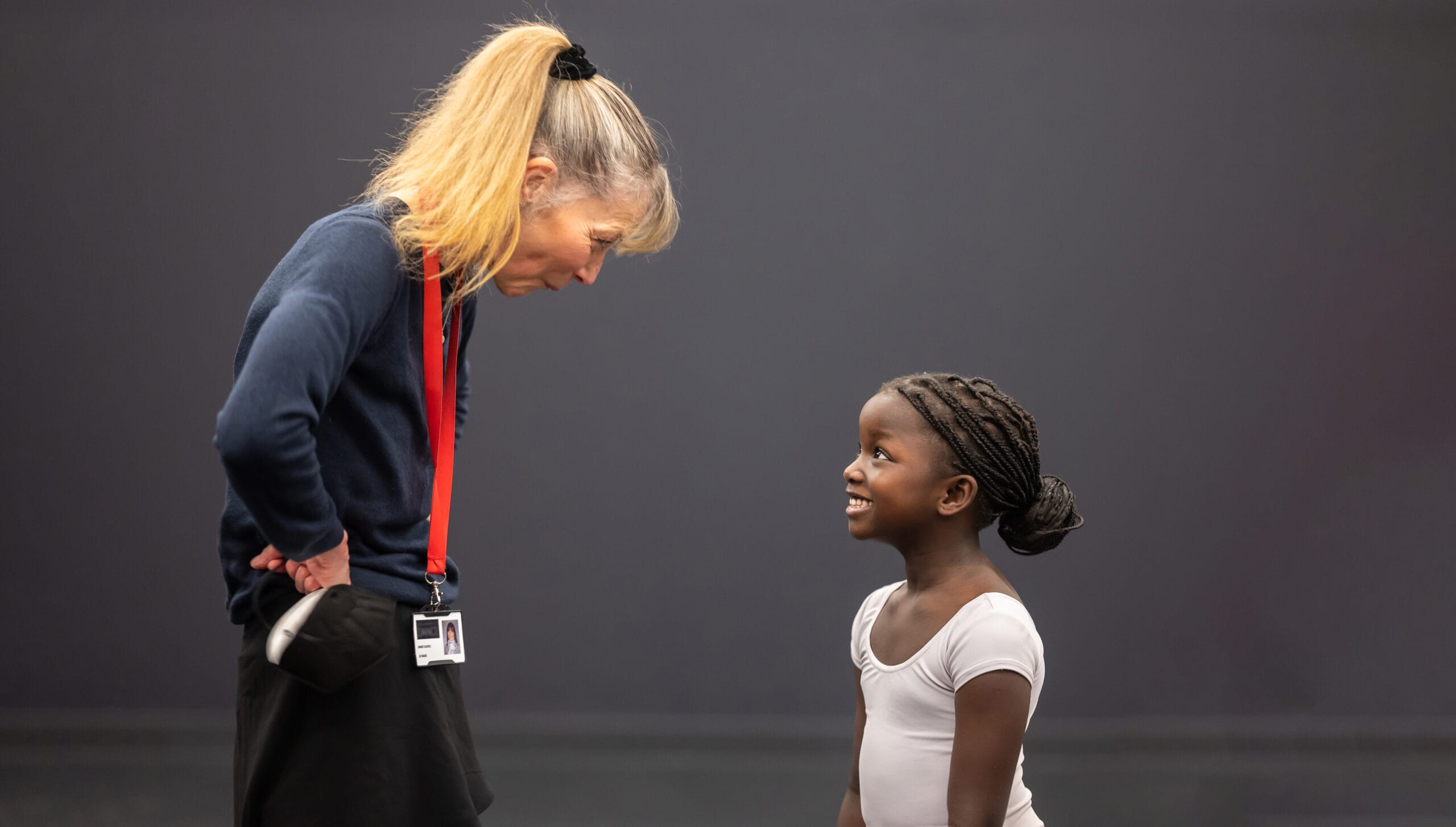 RAD registered teacher and young student outside classroom