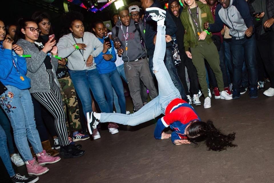 Image of Mona El Ghzal a STEP into dance alumni performing breakdance