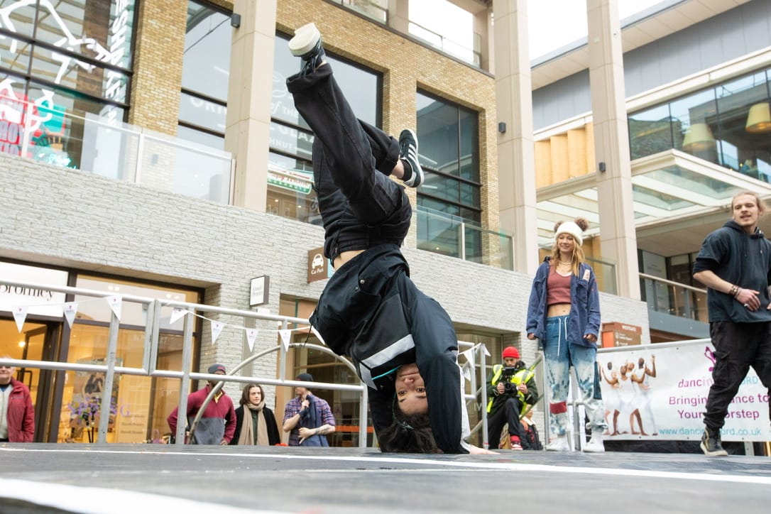 Image of Mona El Ghzal a STEP into dance alumni performing breakdance