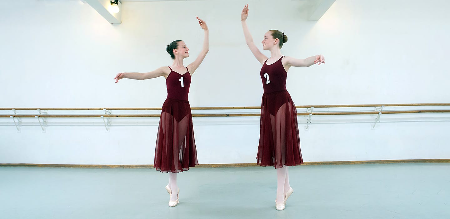 two female dancers taking RAD exams