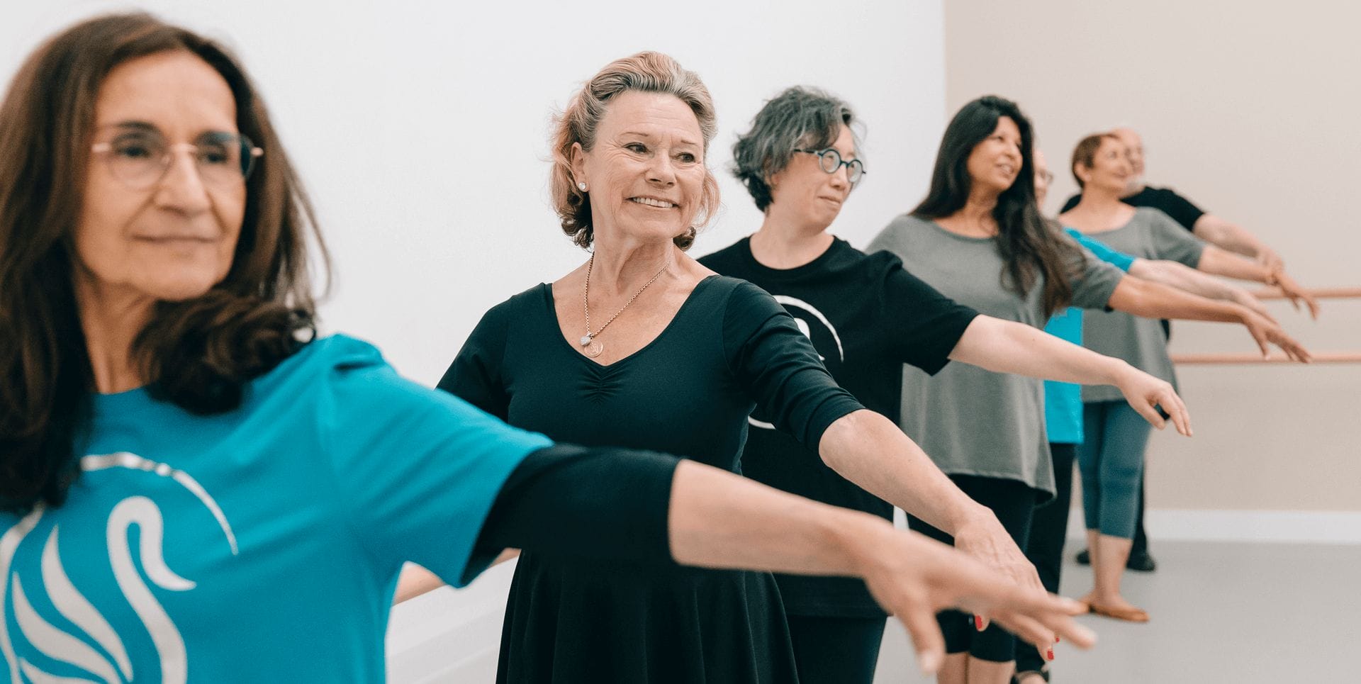 senior students taking an RAD Silver Swans ballet class