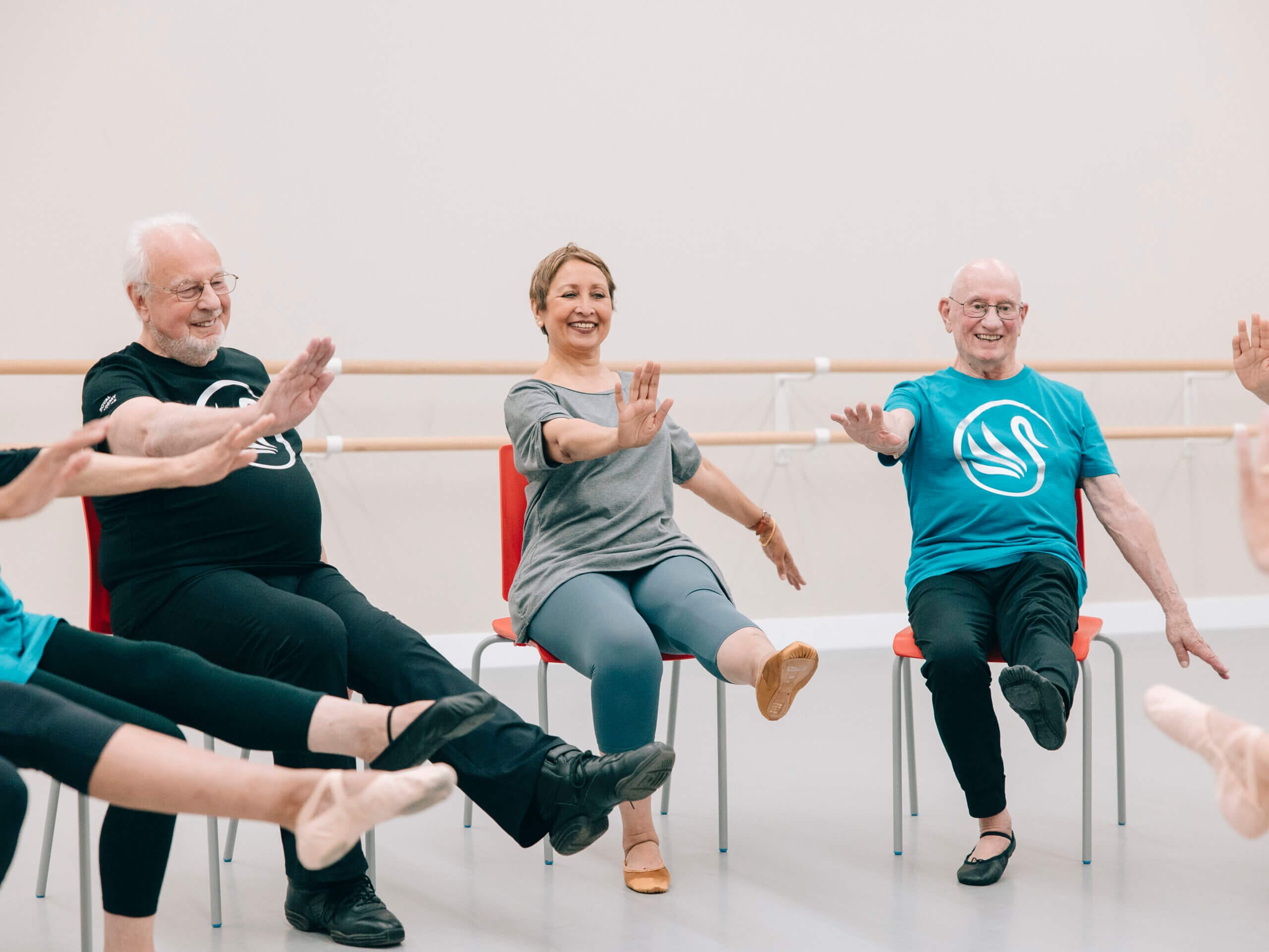 senior students taking an RAD seated Swans class