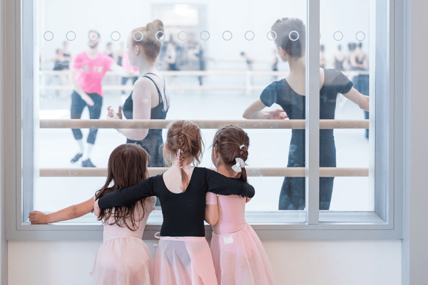 Young students watching older class